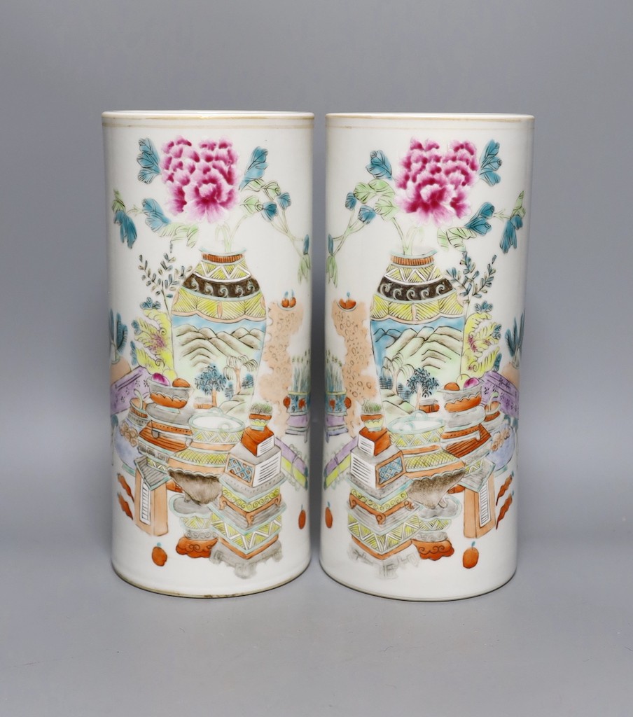 A pair of Chinese famille rose cylindrical vases 27cm